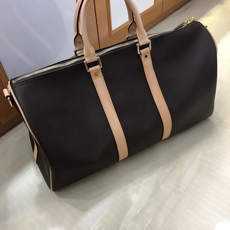 

Designer oxidizing new fashion travelling bag women duffel big size keepall bag genuine leather with high quality free shipping