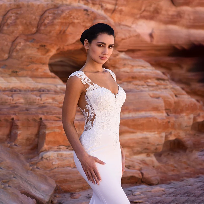 Mermaid Wedding Dresses 2020 Sexy Sleeveless V Neck Beaded Bridal Gowns Illusion Back Princess Wedding Dress Long Train