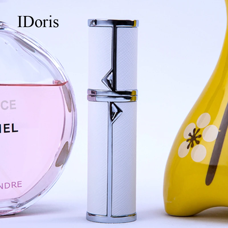 IDoris dispensing artifact spray bottle perfume vaporizers Perfume bottles  empty bottles portable travel press type bottle