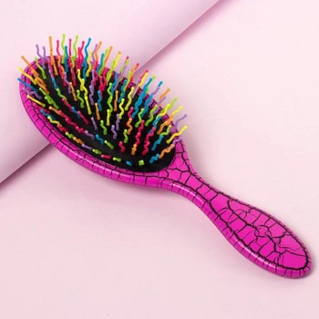

Massage comb, multicolored