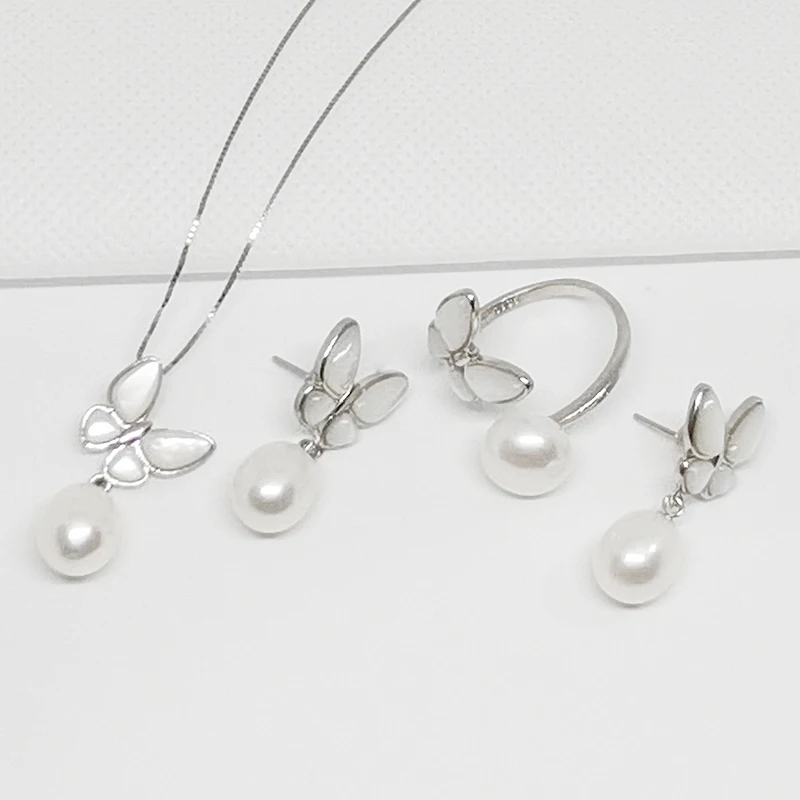 

Комплект из кольца и серёг, из серебра 925 пробы