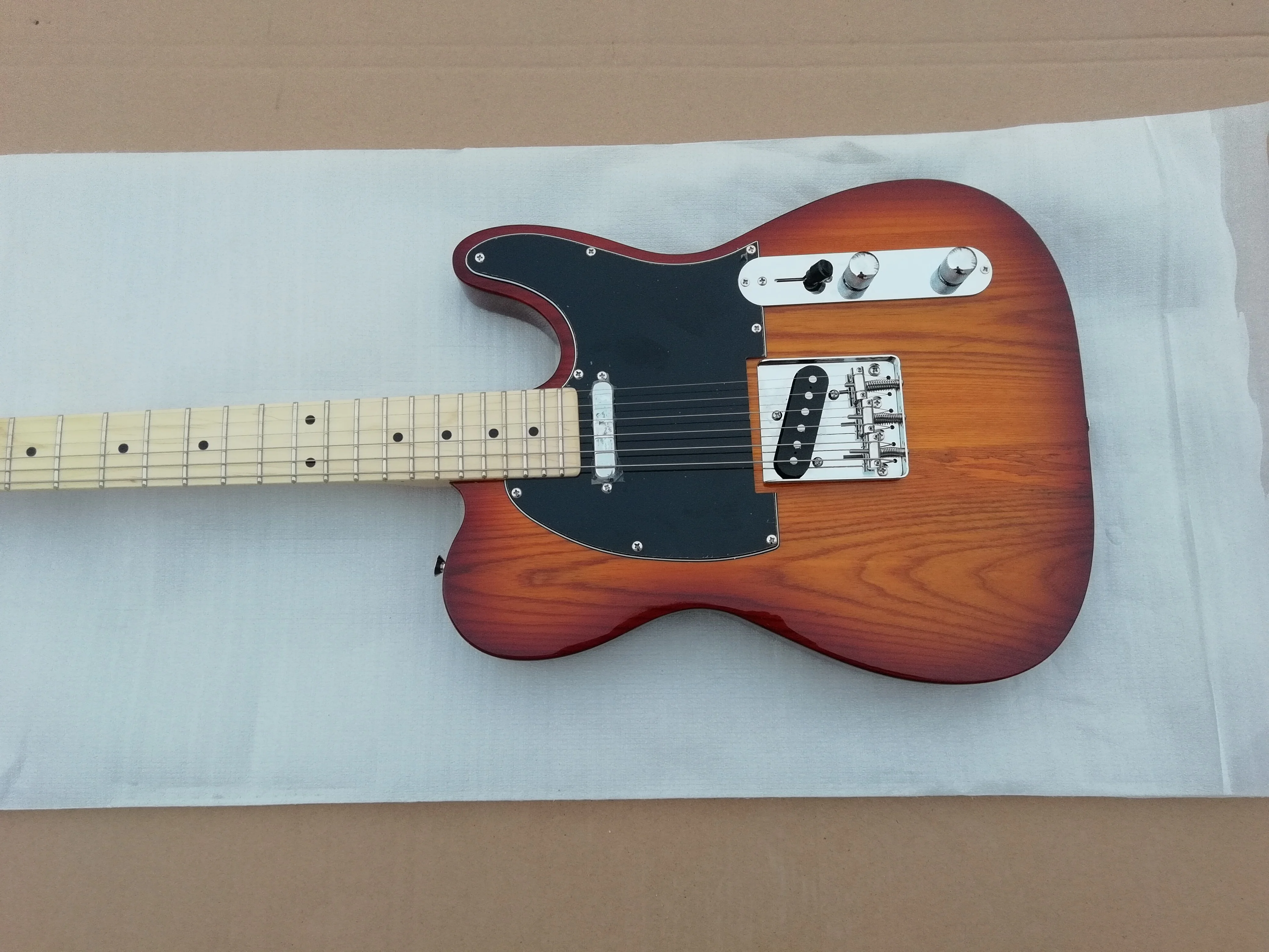 

Sunset or brown transparent color electric guitar