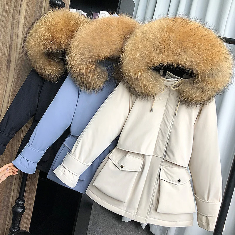 Большой Зимний пуховик с капюшоном из меха енота и лисы женский на 90% белом утином