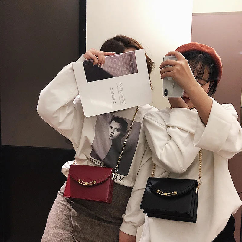 

2019 new three-dimensional small square bag metal twist lock buckle single shoulder slanted female bag
