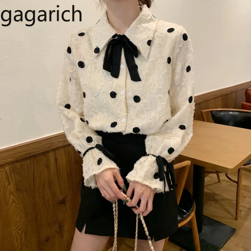 

Gagarich Spring Popular Women Blouses Korean Fashion Bow Lace Up Flare Sleeve Lady Tops Female Chic Wave Point Print Loose Shirt
