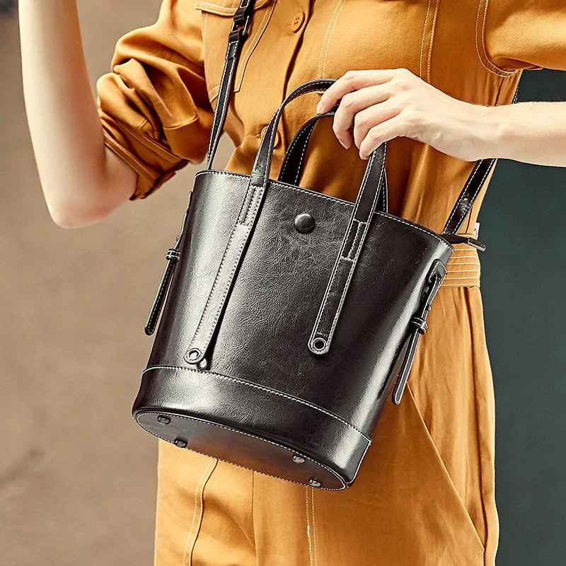 

2019 New Cowhide Women's Bag Retro Simple Single Shoulder Messenger Bag Mini Bag Bucket Bag