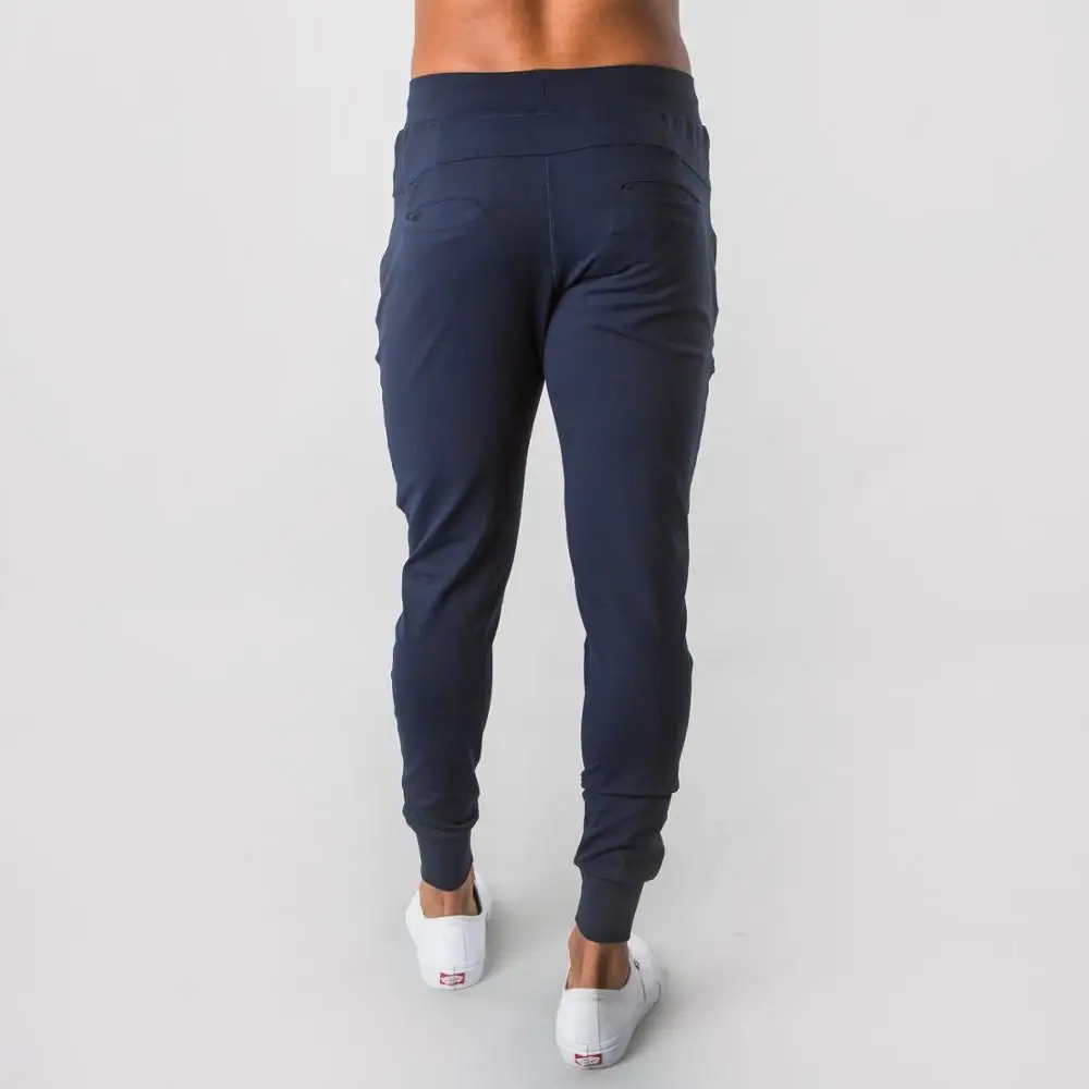 Tanie ALPHALETE marka Casual spodnie obcisłe męskie spodnie dresowe do biegania siłownie Fitness Workout spodnie do biegania bieganie spodnie bawełniane odzież sportowa