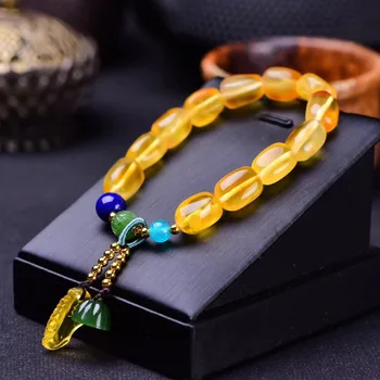 

10 * 12mm boutique Amber with plus jasper lotus poncho bracelet weighing about 13 grams high-end atmosphere