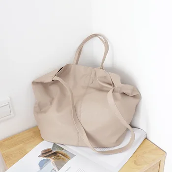 

Korean version of the simple large-capacity tote handbag casual wild fashion PU leather soft face shoulder Messenger bag