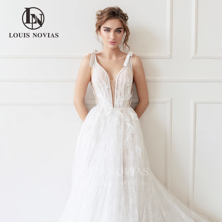 

LOUIS NOVIAS Wedding Dresses Fairy And Elegant Polka Dot Sleeveless A-Line Shiny Fabric Bridal Gowns With 3D Leaves