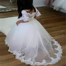 Cheap Cheap White Flower Girl Dresses With Sleeves Boat Neck Princess Tulle Kids Pageant Dress Lace Gown komunia Robe fille ceremonie Cheap Cheap White Flower Girl Dresses With Sleeves Boat Neck Princess Tulle Kids Pageant Dress Lace Gown komunia Robe fille ceremonie
