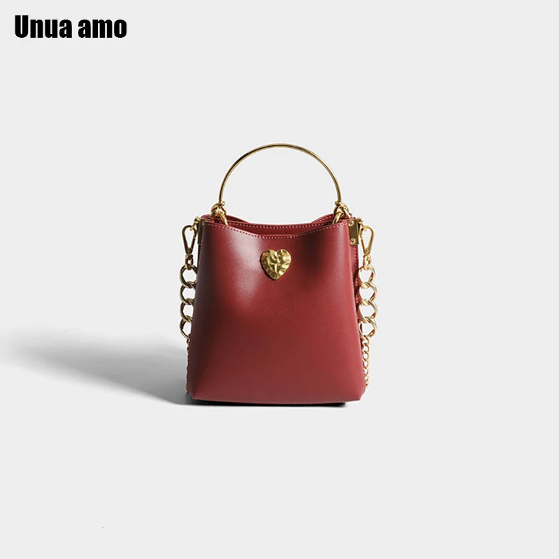 Unua amo, брендовая сумка-мешок для женщин, модная, металлическая ручка, натуральная кожа, сумки для девушек, большая емкость, сумки через плечо