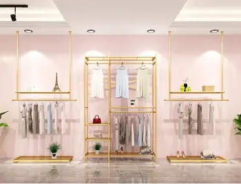 

Wall hanging clothes rack on display shelf of clothing store