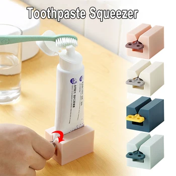 

NEW Rolling Tube Toothpaste Squeezer Toothpaste Easy Dispenser Holder Stand