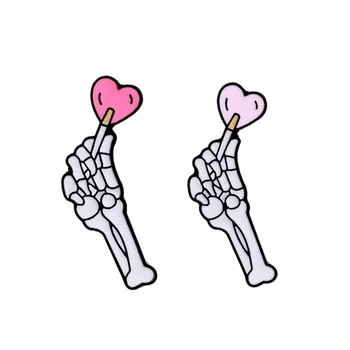 

Cartoon Cute Skull Brooches Creative Hand Bone Holding Love Magic Wand Punk Couple Jewelry Jackets Lapel Pin Badge For Women Men