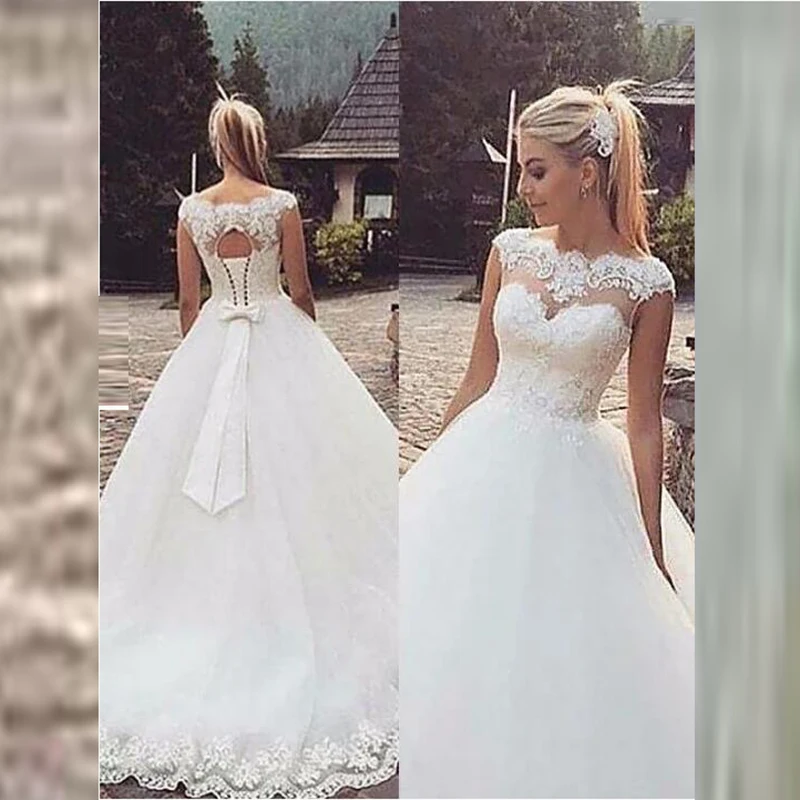 

On Sale Charming Lace Cap Sleeves Bridal Wedding Dresses Illusion Bateau Neck Wedding Gowns for Bride Appliqued Bow Sash Cheap
