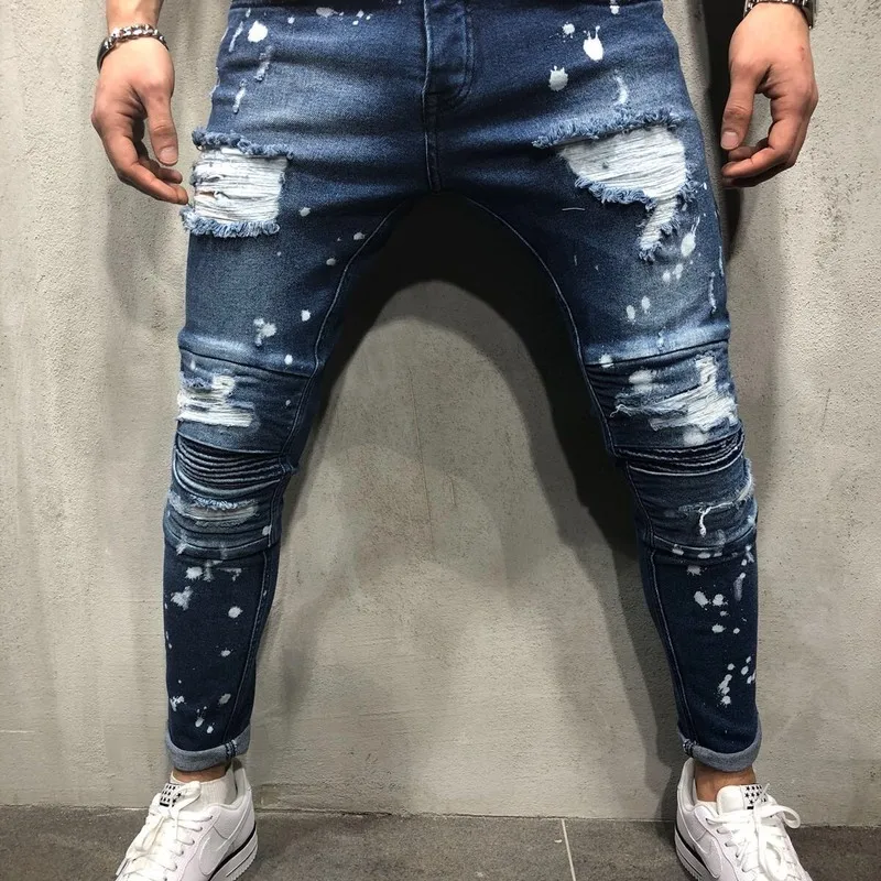 

New European and American men's jeans elastic slim pleated spray painted Leggings men's pants