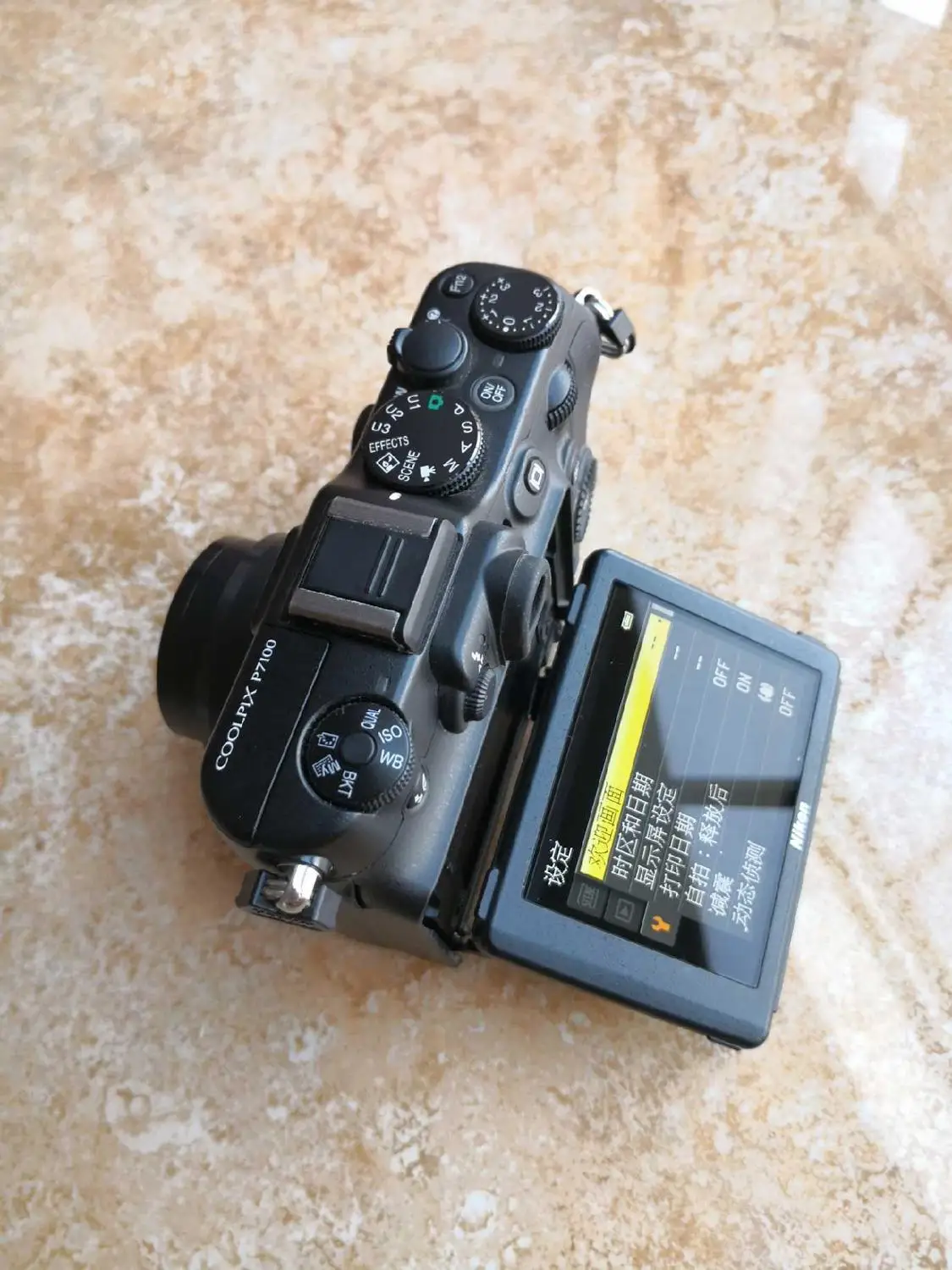 USED Nikon COOLPIX P7100 10.1 MP Digital Camera with 7.1x Optical Zoom NIKKOR ED Glass Lens and 3-Inch Vari-Angle LCD