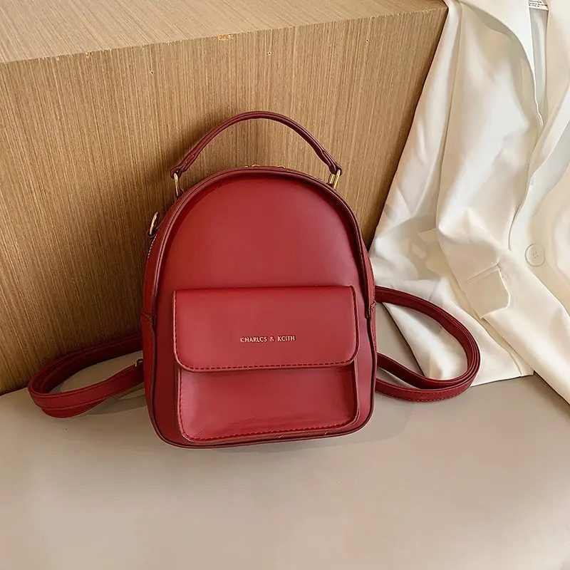 

Fashion Letter Designer Solid Color Small Backpack Women 2020 Luxury Soft Leather Shoulder Bag For Teenage Girls School Bagpack
