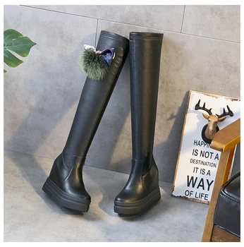 

The new version of the wedge boot adds a high heel to the boot