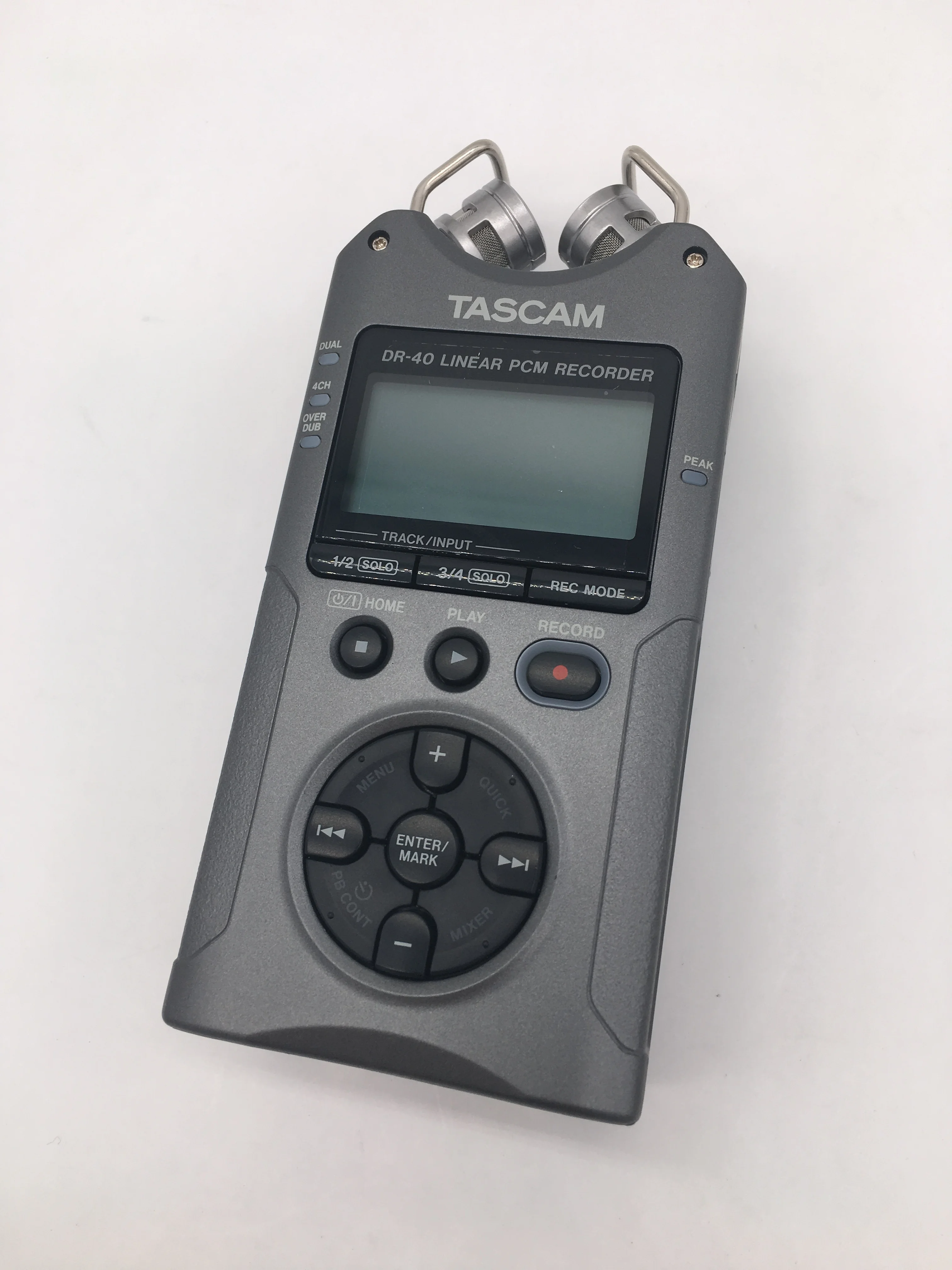 

TASCAM DR-40 handheld 4-channel four-track digital voice recorder professional recording pen with XLR Inputs and Adjustable Mics