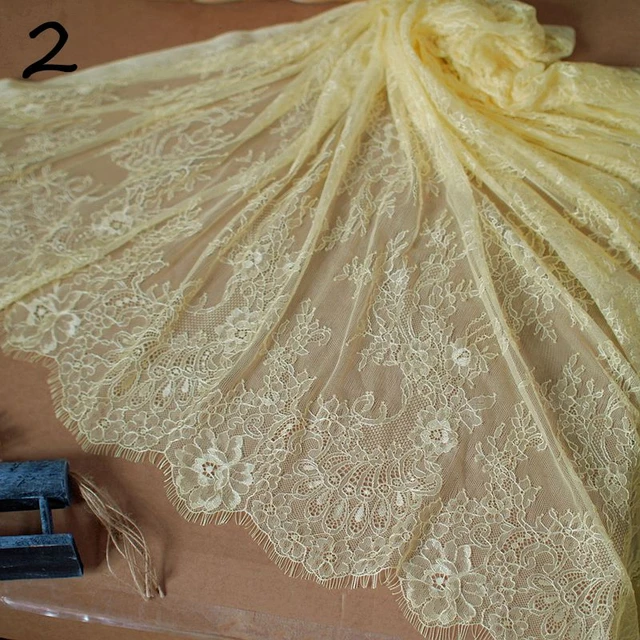 Haute couture gold Chantilly lace, France, $98/yd