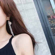 Vrouwen Lange Asymmetrische Shell Conch Hanger Oorbellen Multilayer Parel Kwastje Oorbellen(China)