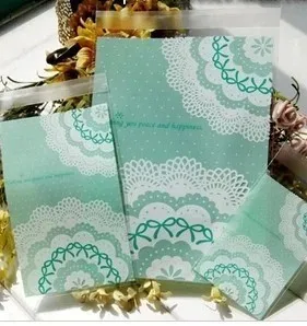

E1 Size15*23cm 100 pcs/lot Green lace bow Cookie packaging clear plastic bags for biscuits snack baking