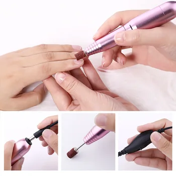 

Nail Drill Machine for Manicuring Pink Silver Electric Portable Nail Cutter Metal Easy to Operate Pen Shap with Nail Bits 1 Pc