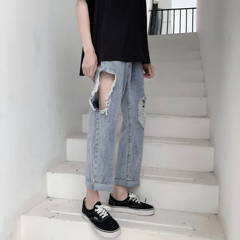 Ripped jeans men's straight loose-fitting trend Korean version of the summer thin nine-point wide-legged pants.