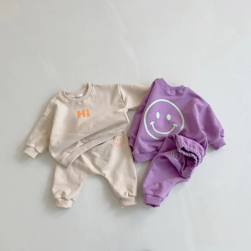 7595 Kids Clothing Set 2021 Spring And Autumn Boys Suit Smiley Face Sweatershirt+Sports Pants Girl Two Piece Suit School Unifor Baby Clothing Set near me