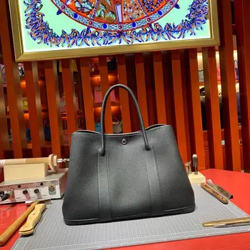 

The highest quality ladies luxury fashion handbags quality classic 100% leather brand famous ladies hand-made handbags free ship