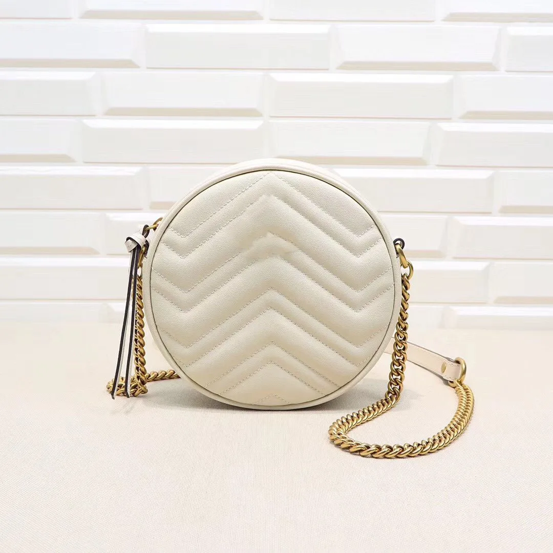 

Leather early spring ladies new round mini shoulder bag, designer bag, quality chain bag