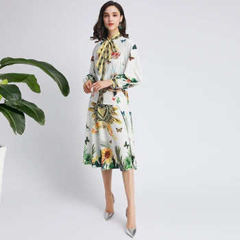 

Xiaomoli Elegant bow tie, silk ribbon, printed shirt and skirt two piece set, new in autumn and winter 2019
