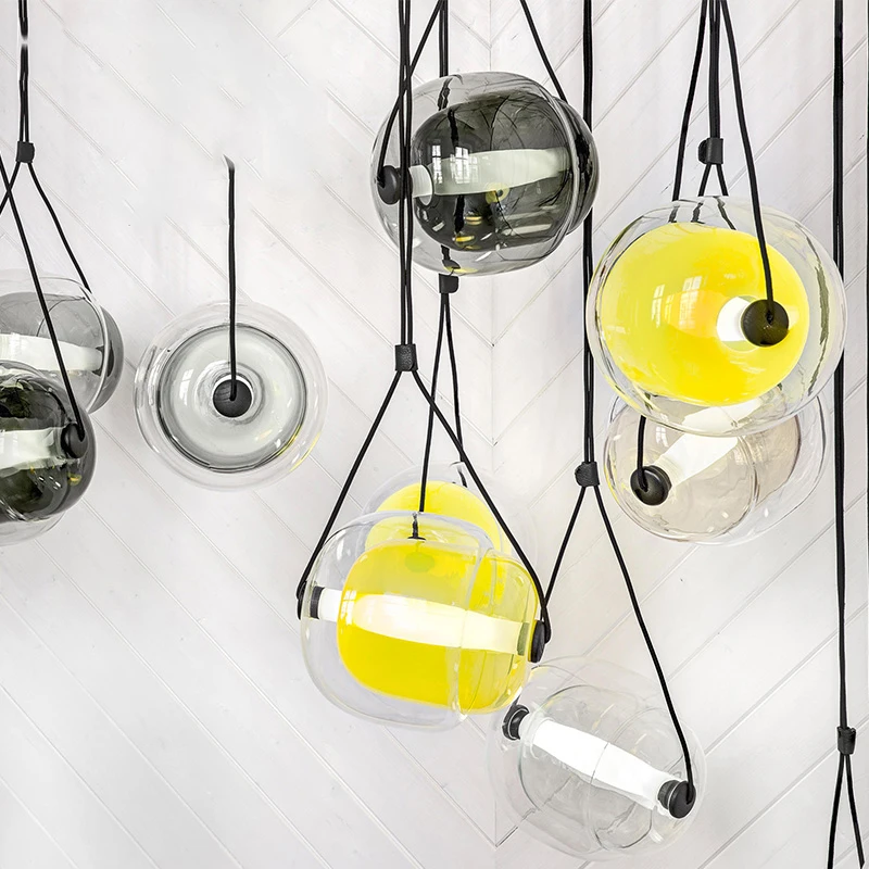 

Wooights Italian post-modern Nordic oval ball Glass Pendant Lights for cafe single head Cord Pendant Lamp for Resturant office