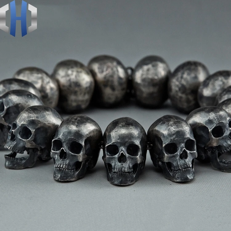 Браслет из черепов. Браслет "Skull" (Art. B 1535). Браслет с черепами "Skull Karma" с ониксом. Бусины в виде черепа. Браслет стальной с черепами мужской.