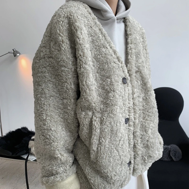 Winter women\'s casual solid color V-neck long-sleeved loose lamb wool coat