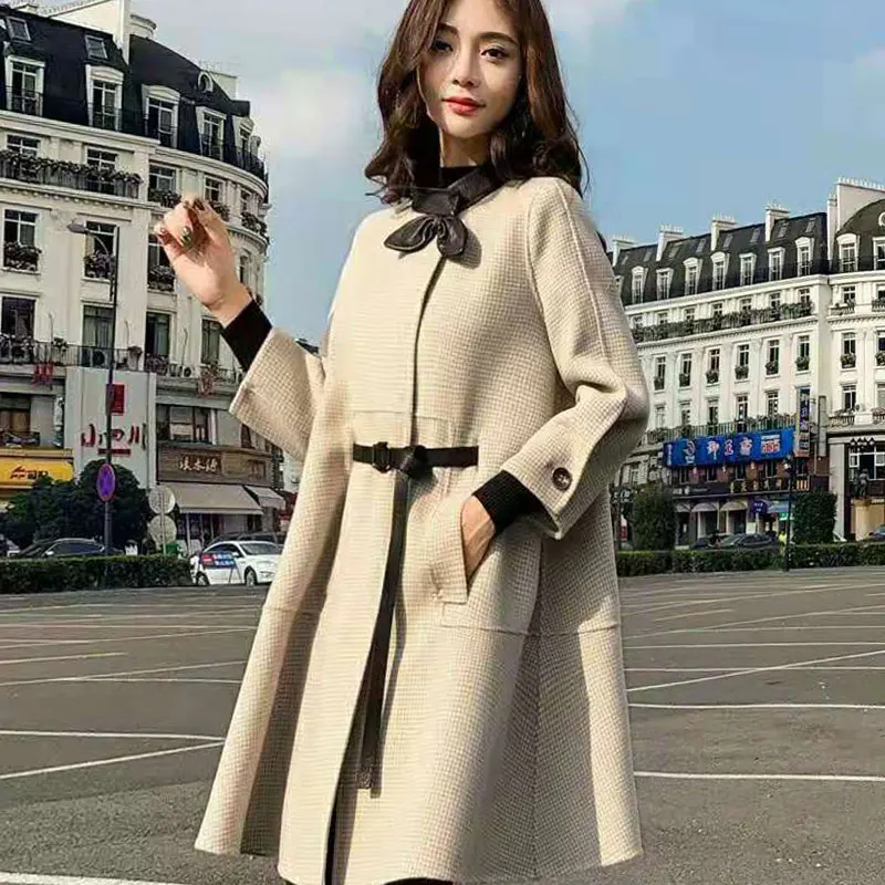 

women's cape lattice woolen coat 2019 Winter Female fashion Breasted Turn-down Collar Pocket Wool Blends jacket coat