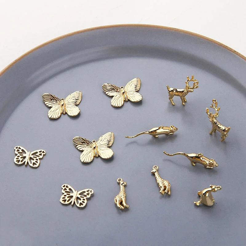

4pcs Copper Plated Animal Earrings Bag Golden Elk Mouse Little Duck Butterfly Giraffe Earrings For Women Girls Diy Material