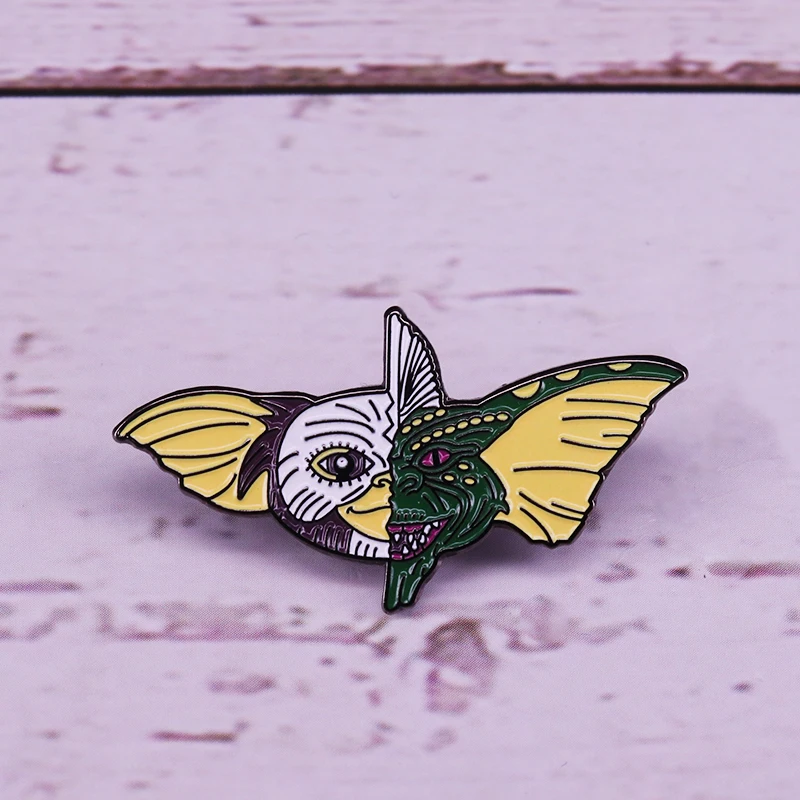 

Yin yang Gremlins pin retro 80s comedy horror film brooch