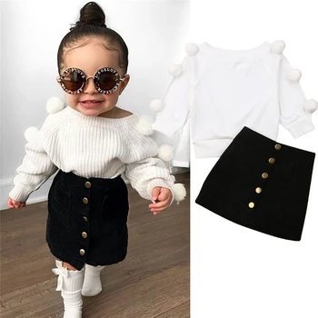 

0-18 Months Baby Girl Clothes White Striped Sweater With Pompons On Long Sleeves And Solid Black Skirts