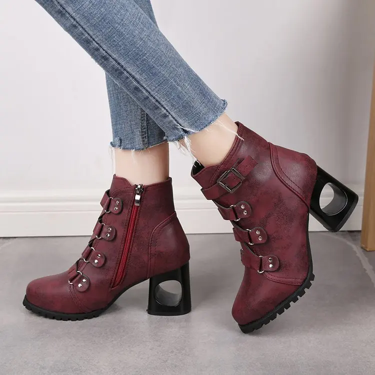 Martin boots women's thick heel winter new large size high heel belt buckle rivet short boots explosion models women's shoes.