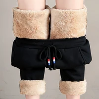 Kobiety zimowe grube jagnięce kaszmirowe spodnie ciepłe kobiece dorywczo spodnie bawełniane luźne Harlan długie spodnie Plus rozmiar S-5XL 3XL 4XL 3