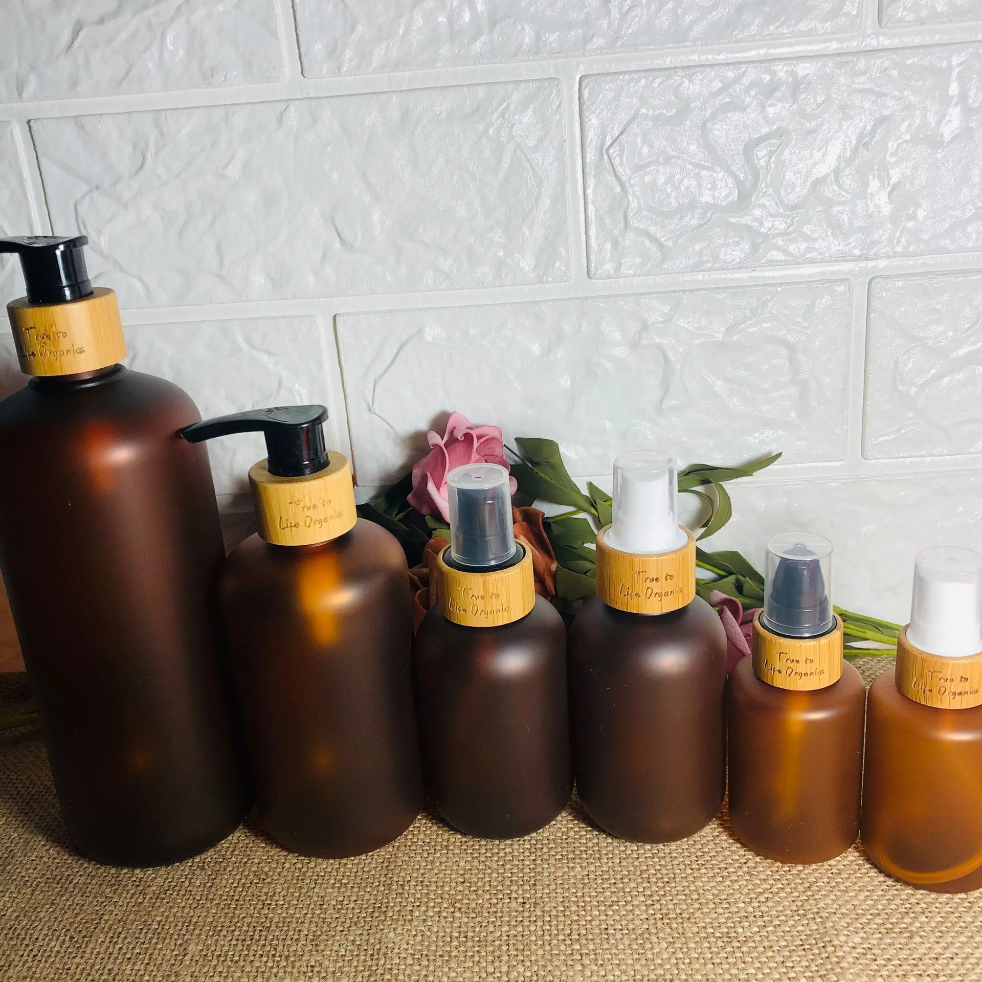 Wholesale Custom  Amber Plastic PET Beauty Hair Tools Shampoo Hand Wash Lotion Bottles With Bamboo Pump Lid Cap wholesale 100ml 500ml empty shampoo lotion bottle white pet bottle with lotion pump for hand sanitizer body wash bottle