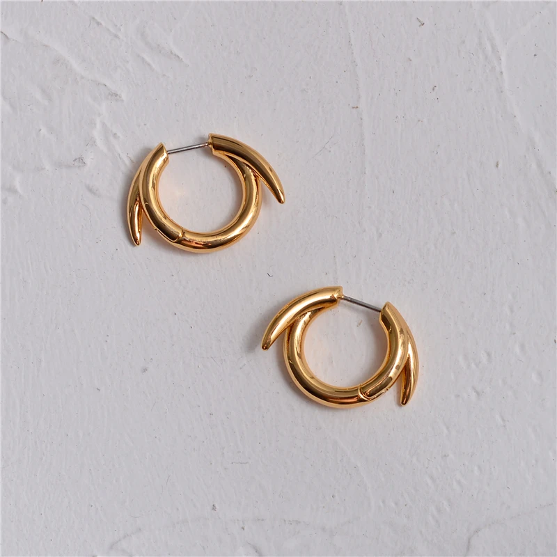 Golden spike circle earrings female European and American minority design personality punk style cool handsome cool earrings