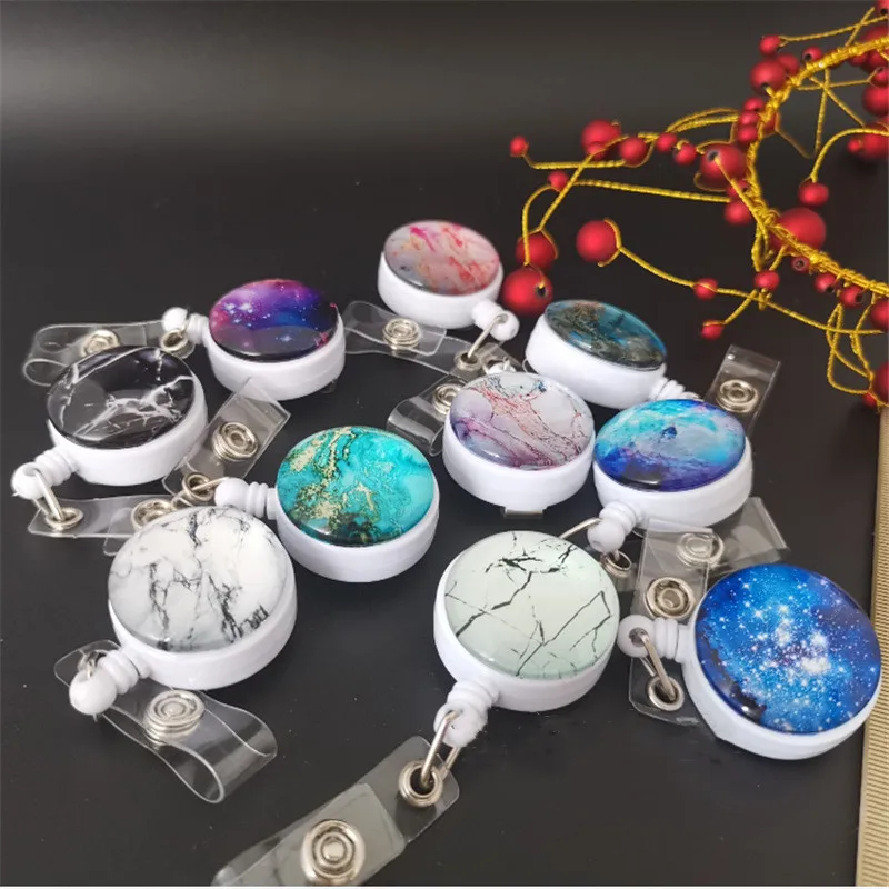 

Hot 1PC Creative Starry Sky Marble Pattern High Quality Retractable Nurse Badge Reel Clip Cute IC ID Card Badge Holder