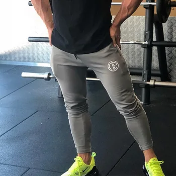 

Men Jogging Running Pants Men Sport Pencil Pants Bodybuilding Quick dry Fitness Gym Trousers Tights Sweatpants with Zip pocket