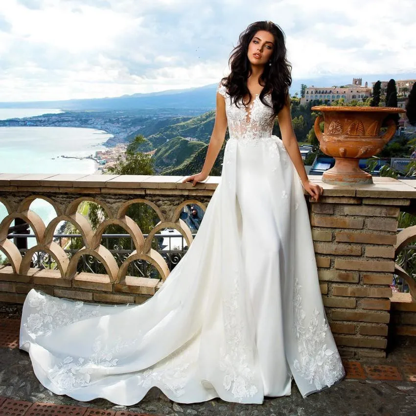 amazing-a-line-lace-overskirt-wedding-dresses-sheer-bateau-neck-backless-bridal-gowns-sweep-train-appliqued-tulle-plus-size-robes-de-mariée (2)