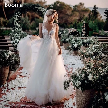 

Ivory Illusion Beach Wedding Dresses Deep V-Neck Backless Long Bride Dresses Lace Appliques A Line Tulle Bridal Gowns