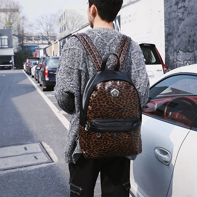 

Rivets college students computer backpack Korean version of fashion men's and women's shoulder bags